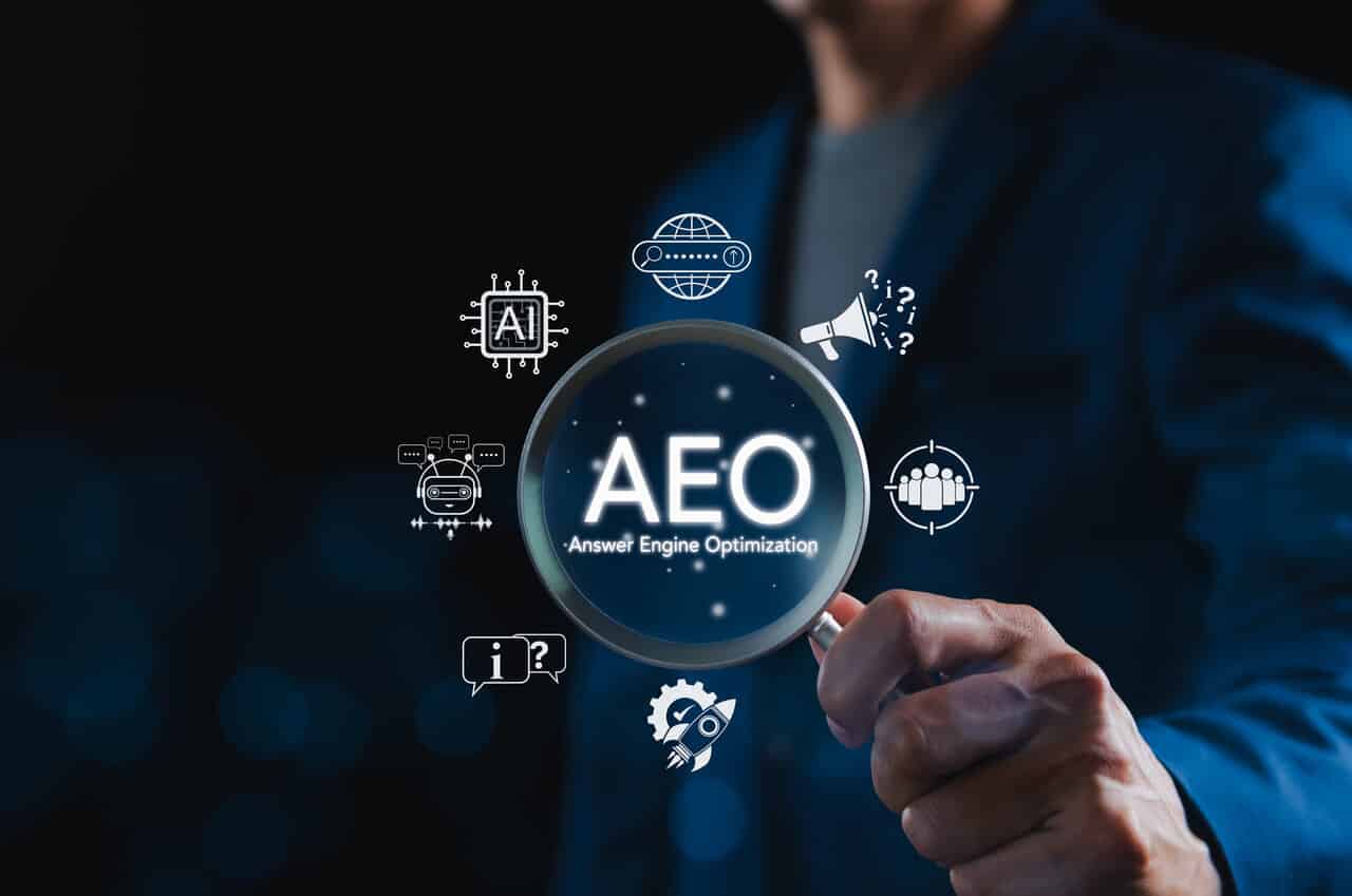 A person holding a magnifying glass, highlighting "AEO - Answer Engine Optimization" with icons related to AI and communication. AEO Services in Buffalo